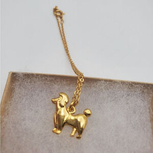 Fancy poodle gold toned bracelet‎